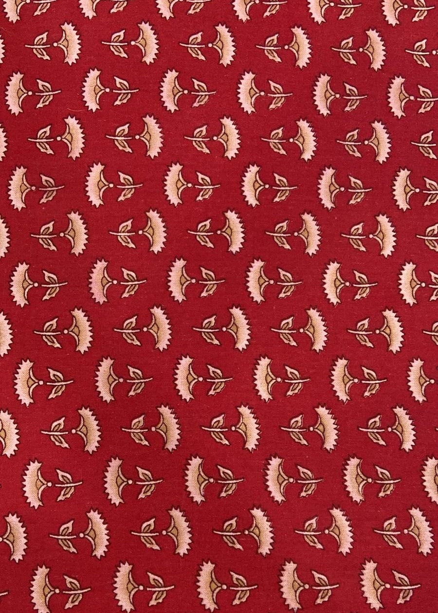 Pattern of pink flowers on a red background