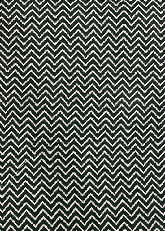Pattern of greem and white chevron stripes on a textured background